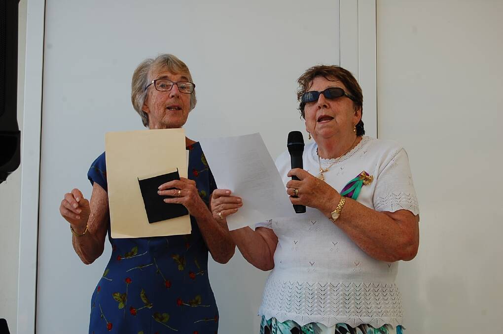 A rousing rendition of 'I am Woman' was led by Margaret Sheaves (left).