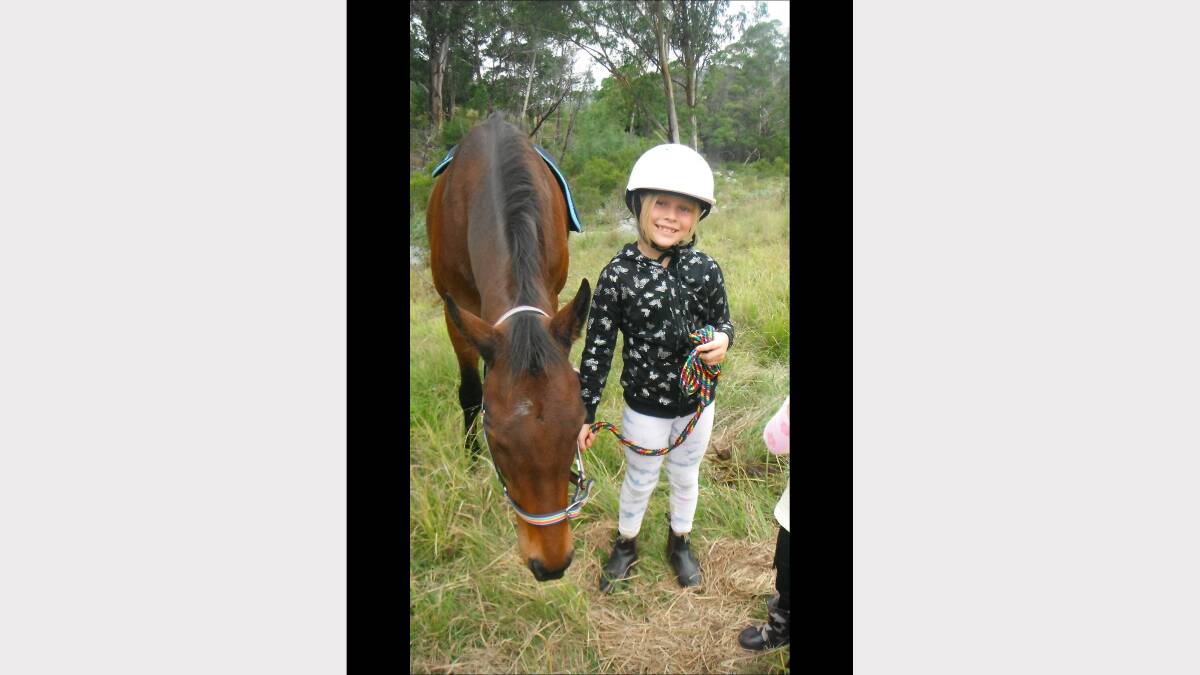 Wyndham girl Taleeah Heffernan, pictured with her horse Cinders, is helping mum Jess to gather donated goods for injured animals in the Blue Mountains fires.