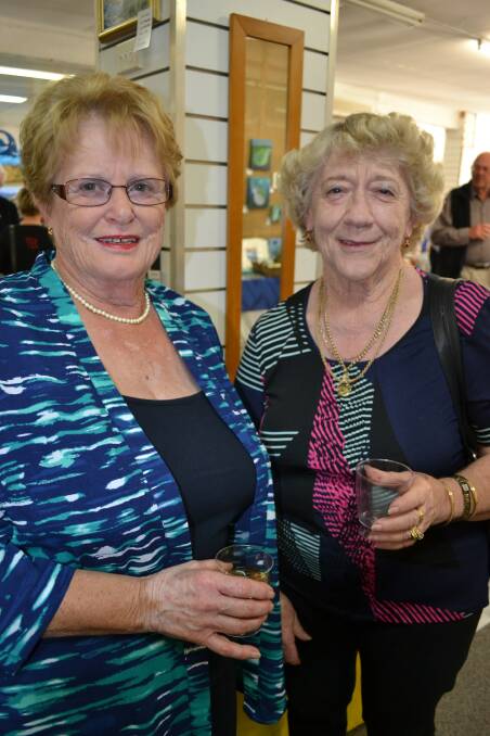 Jan Blaxter and Fay Davidson admired the lovely wood work on display. 
