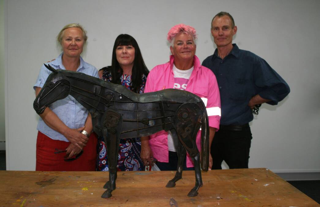 Artist Suzie Bleach, council staffer Vicky Hodges, BVRG curator Megan Bottari and artist Andy Townsend admire the Horologist’s Horse.