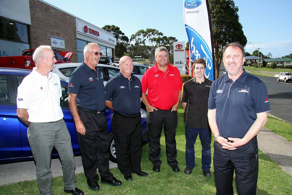 Eden Motor Group dealer principal and managing director Con Zurcas (right) with fixed operations manager Cecil Miller, sales team Bill Taylor, Brad Evans, Matt Taylor and first year apprentice Nathan Goodrich.
