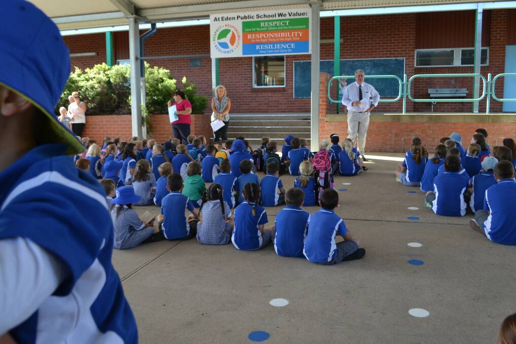 Principal of Eden Public Primary School John Davidson addressed the returning students prior to being called into their new classes.