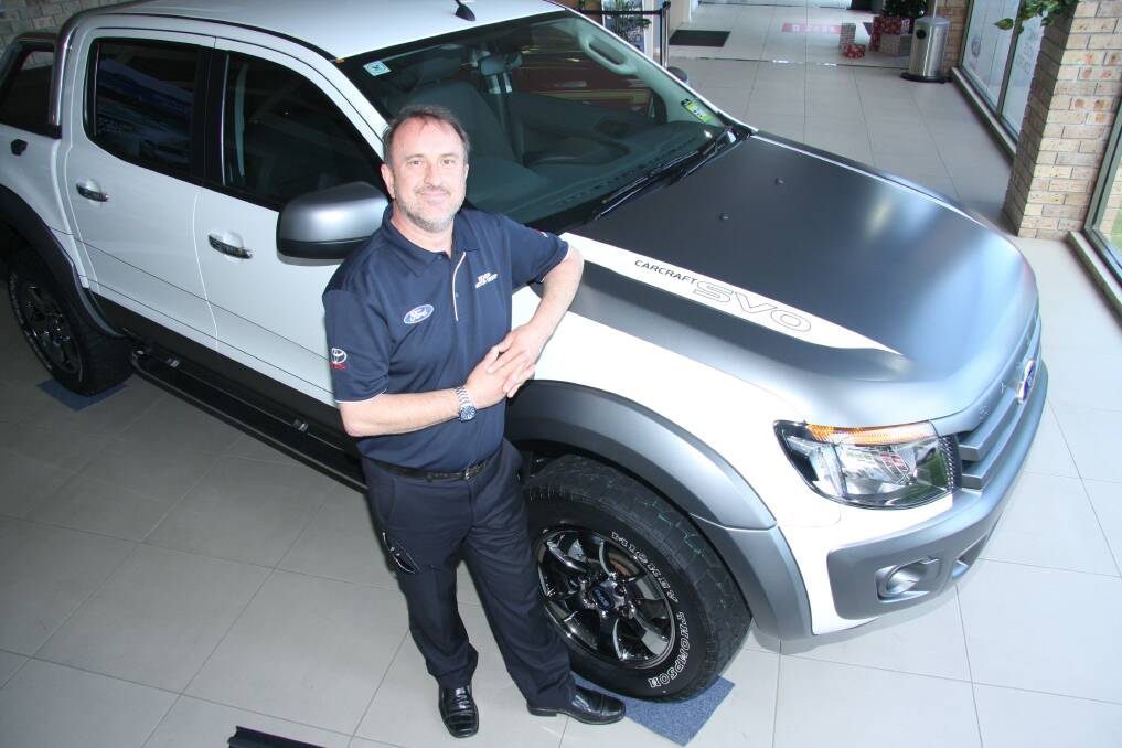 Mr Zurcas in the Eden Motor Group showroom with the new customised Ford Ranger.