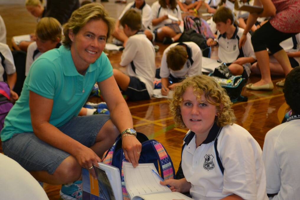 Teacher at Eden Marine High School Jane Hornsby enjoyed a welcoming chat with new year seven student Timika Altmann. 
