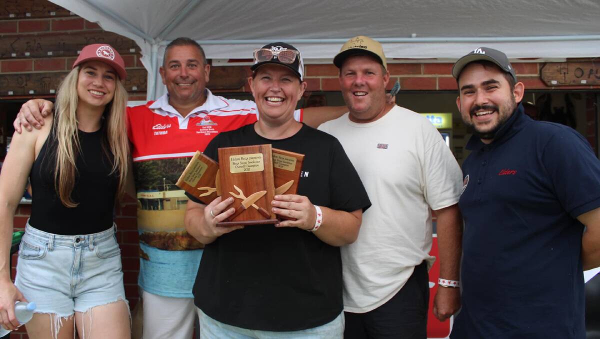 Kimmi Taylor from NOMAD Kitchen and BBQ is congratulated by judges Kezie Apps, Matt Christison, Dave Armstrong and BBQ Smokeout organiser Matthew Hughes. Picture courtesy of Bega Show 