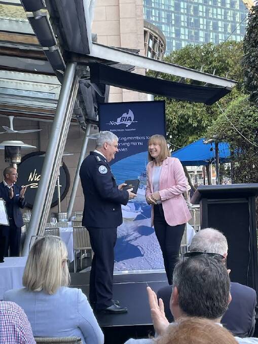 Minister for Transport Jo Haylen presents Marine Rescue Merimbula Unit commander Bill Blakeman with the NSW Maritime Medal during a ceremony at the Sydney International Boat Show in Darling Harbour. Picture supplied. 