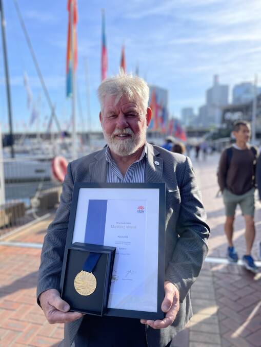 Kevin Hill of Marine Rescue Jervis Bay received the NSW Maritime Medal for safety. Picture supplied.
