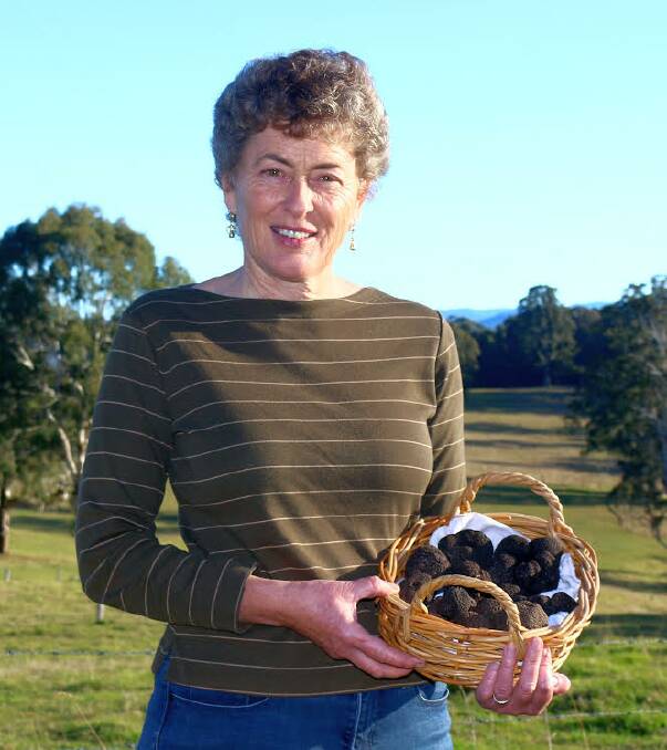 Fiona Kotvojs and a basket of freshly unearthed truffles. Photo supplied.