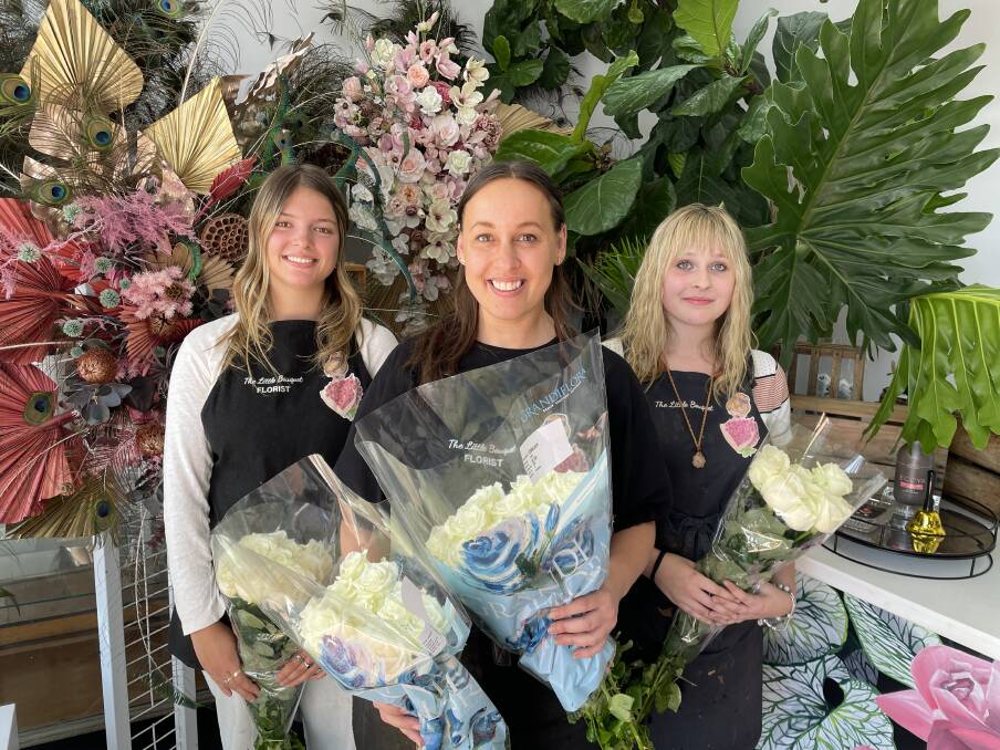 Meet the team at The Little Bouquet that prepared the roses and bouquets for Valentine's Day. Left to right: Marlee Ahmat, Jasmine Fleet and Bella Fleet. Picture by Amandine Ahrens 
