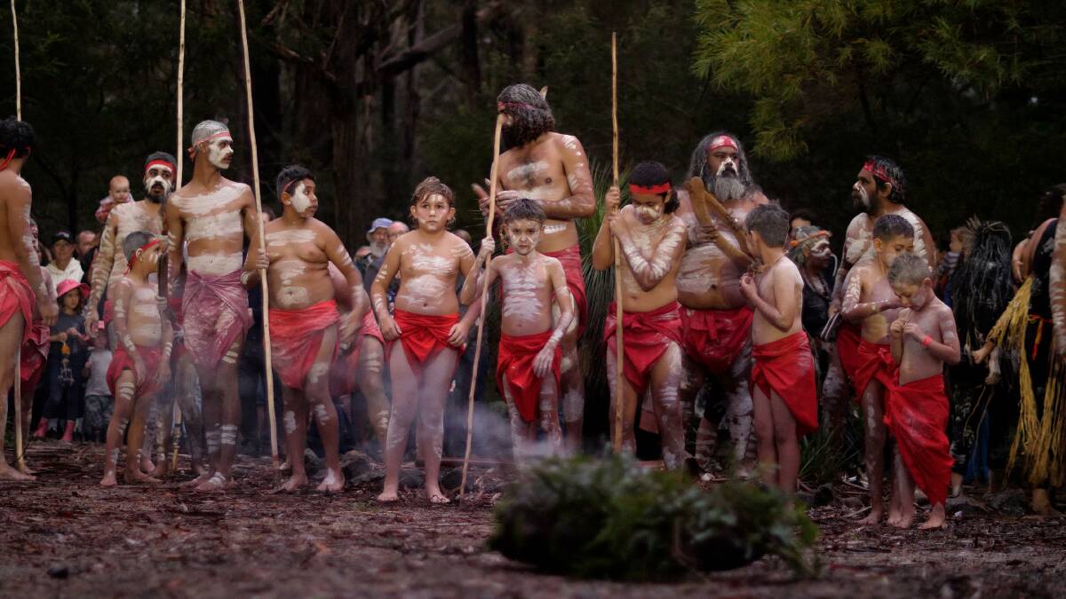 Members of the Duruunu Miru and Gudu and Gumaraa Dance Groups get together for the sunset corroboree at Giiyong Festival. Photo: Kyle Wilson 