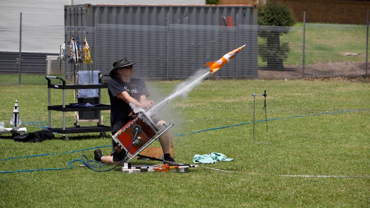 Science teacher Leigh Lemmon launching a rocket for his students. Picture from St Joseph's Catholic High School Facebook page