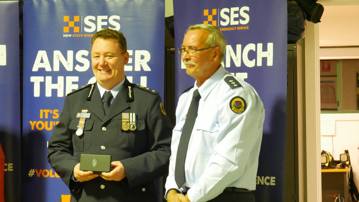 South Eastern zone commander Colin Malone and award recipient John Mills. Photo: Ellouise Bailey 