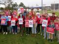 Teachers from Bega Valley Primary School and Bega High School met at Bega's Littleton Gardens to support their peers from around NSW undergoing a 24-hour strike. Photo: Ellouise Bailey