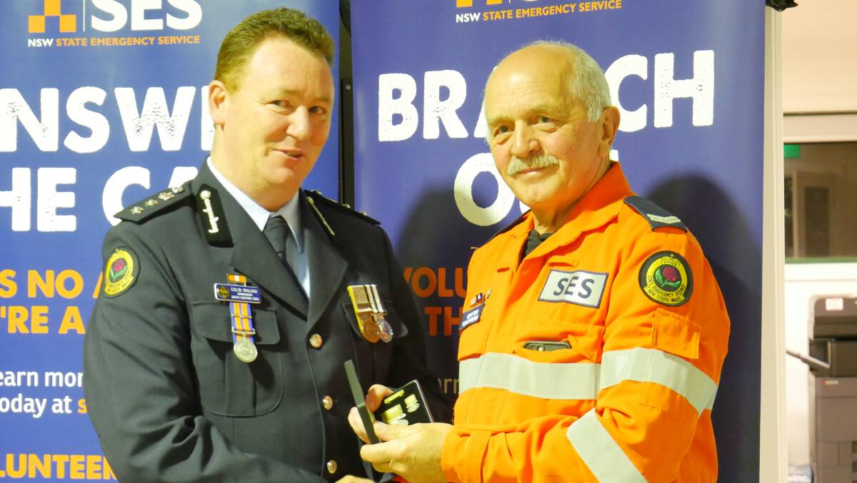 South Eastern zone commander Colin Malone and award recipient Gunter Baurhenn. Photo: Ellouise Bailey 