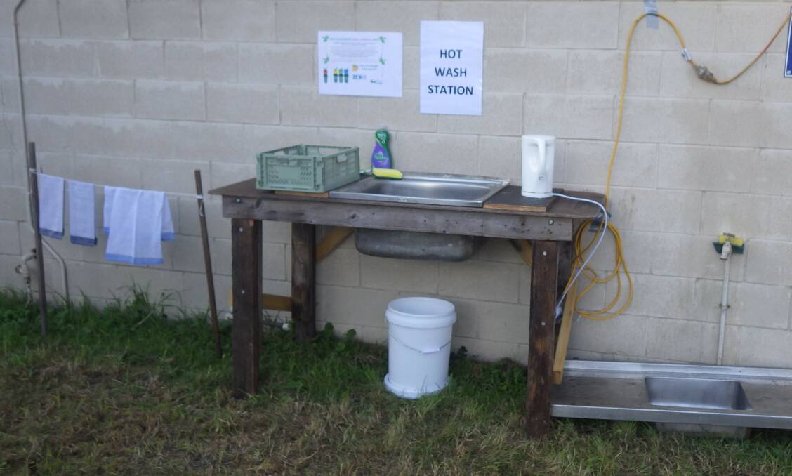 One of two hot wash stations set up at the Cobargo site so festival-goers can clean any single-use plastics they need to take home (as no red-lid rubbish bins on site) and for campers using reusables. Picture supplied.