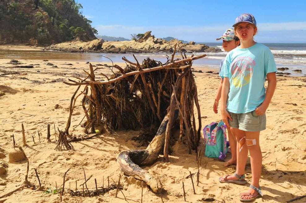 One of the Yowie-inspired huts which included a fence from sticks pushed into the sand, and seaweed to enclose the shelter. Picture supplied