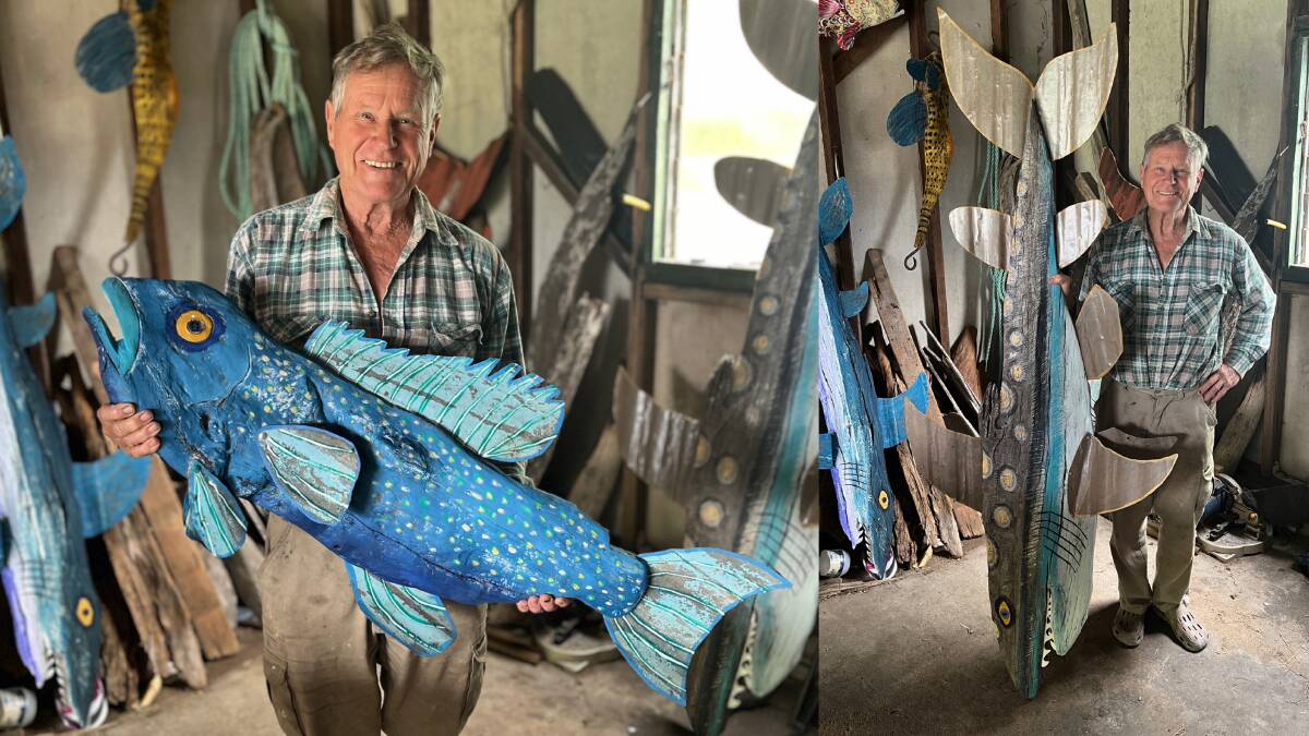 Bill Insch within his garage, surrounded by driftwood fish, sharks, and a seahorse he created from recycled materials. Pictures by James Parker