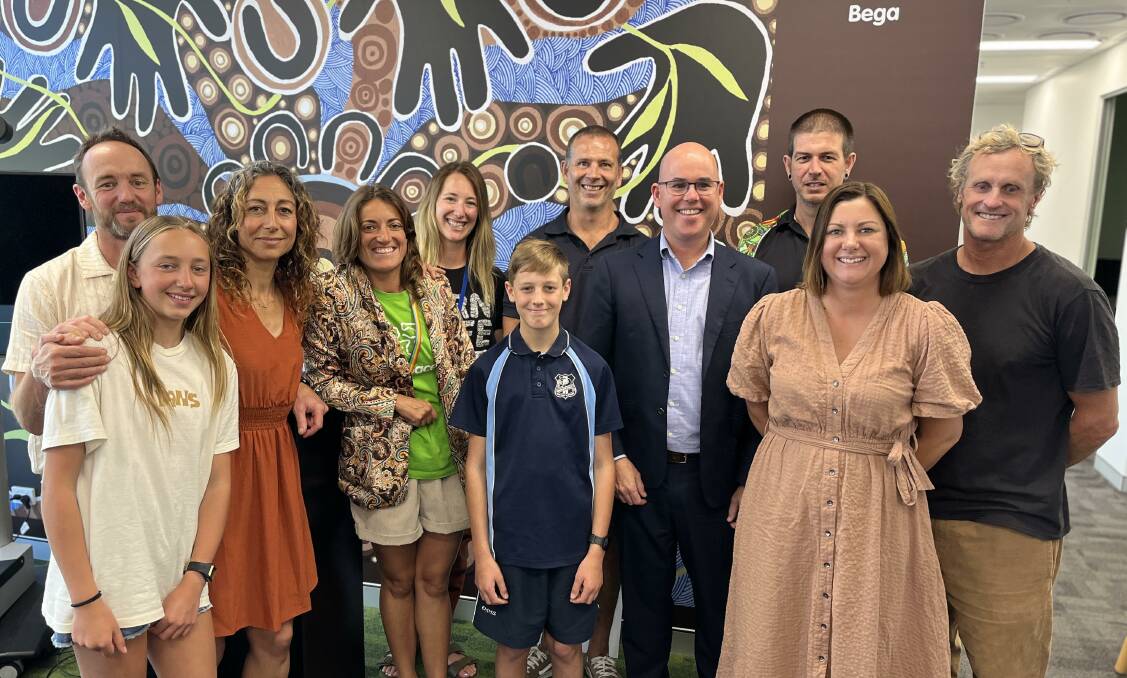 Axl stands in the middle, surrounded by his family pictured on the far left, a number of the headspace Bega team, the headspace CEO Jason Trethowan on the right next to Kristy McBain and Simon Daly. Picture by James Parker