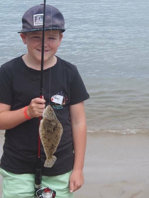 Beau catches a flounder at last year's Kids Gone Fishing Day in Eden