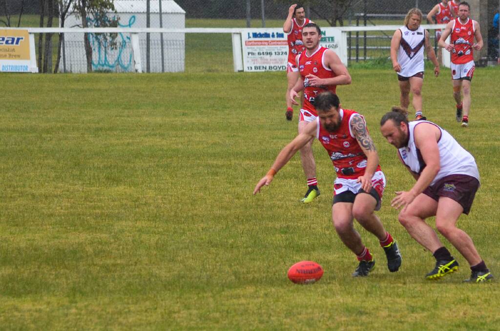 AWASH: The Eden Whalers had a rain-soaked win at the weekend, but have been granted welcome bushfire relief funding from the AFL. Photo: Nicole Crowe