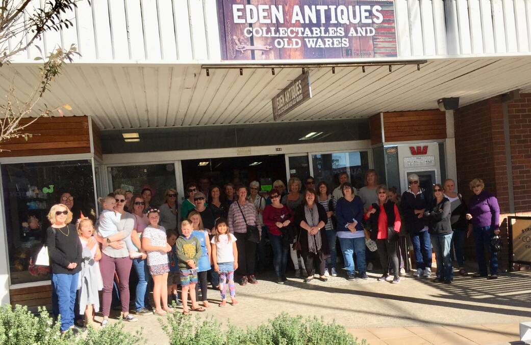 Thirty-five people joined Eden's latest Cash Mob, which dropped by Eden Antiques and Collectables.