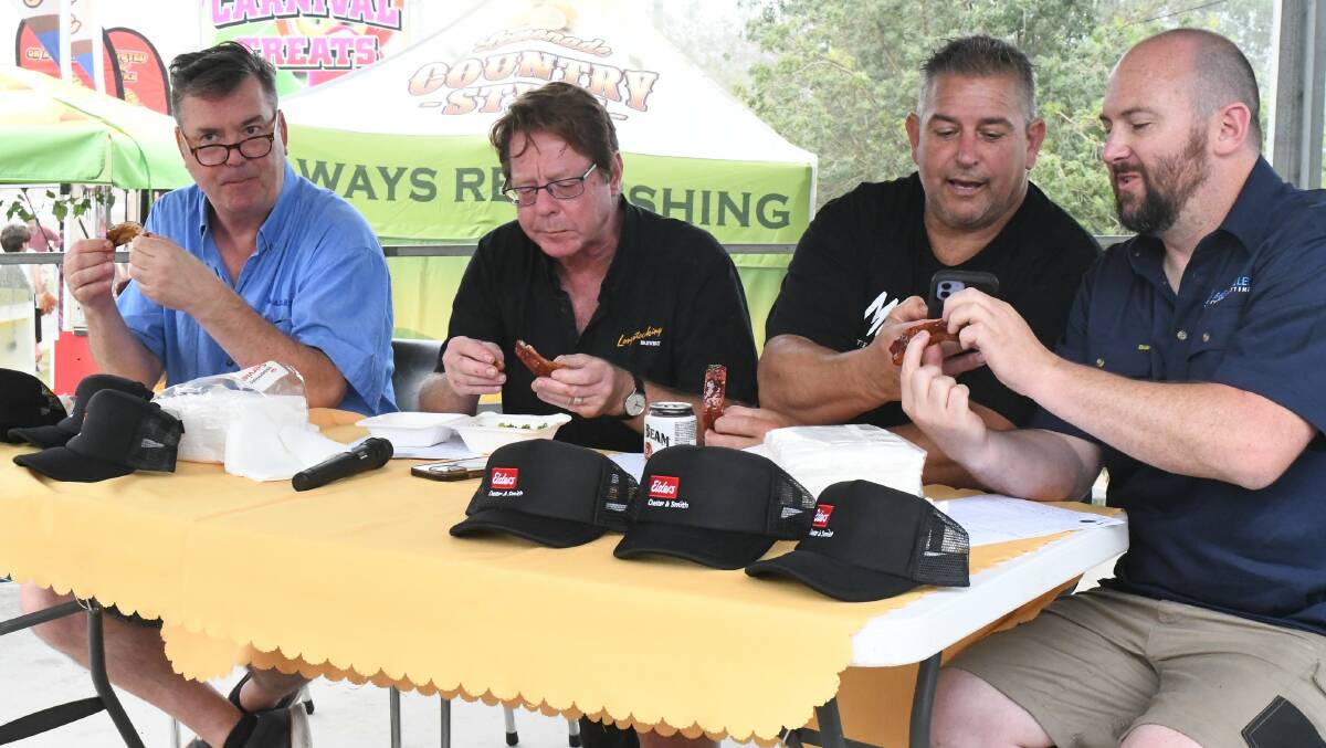 Judges in the Bega Community Event's BBQ Smokeout (from left) Simon Marnie, Peter Caldwell from Longstocking Brewery, butcher Matt Christison and Josh from Bega Valley Laser Cutting. Picture by Ben Smyth