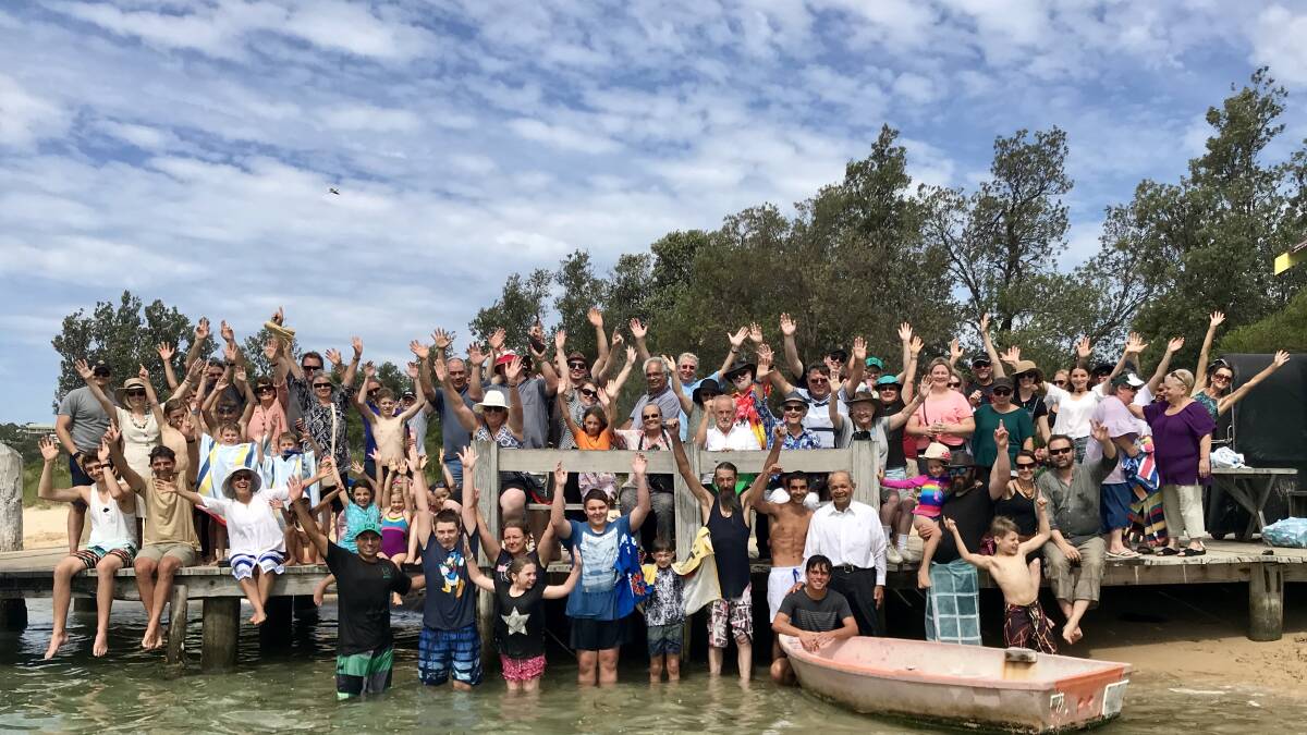 Mitchies Jetty was the scene of a baptism as people from Eden Aboriginal Evangelical Fellowship joined those from Sapphire Life Church on Sunday afternoon.