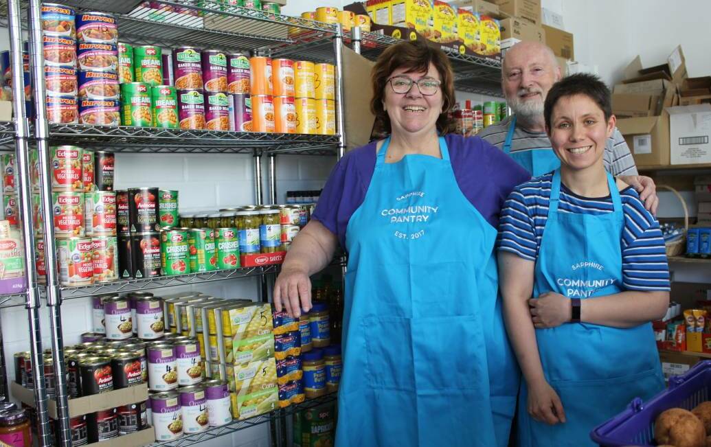 Sapphire Community Pantry's Christine Welsh and Peter Buggy with volunteer Jessica Beasley.