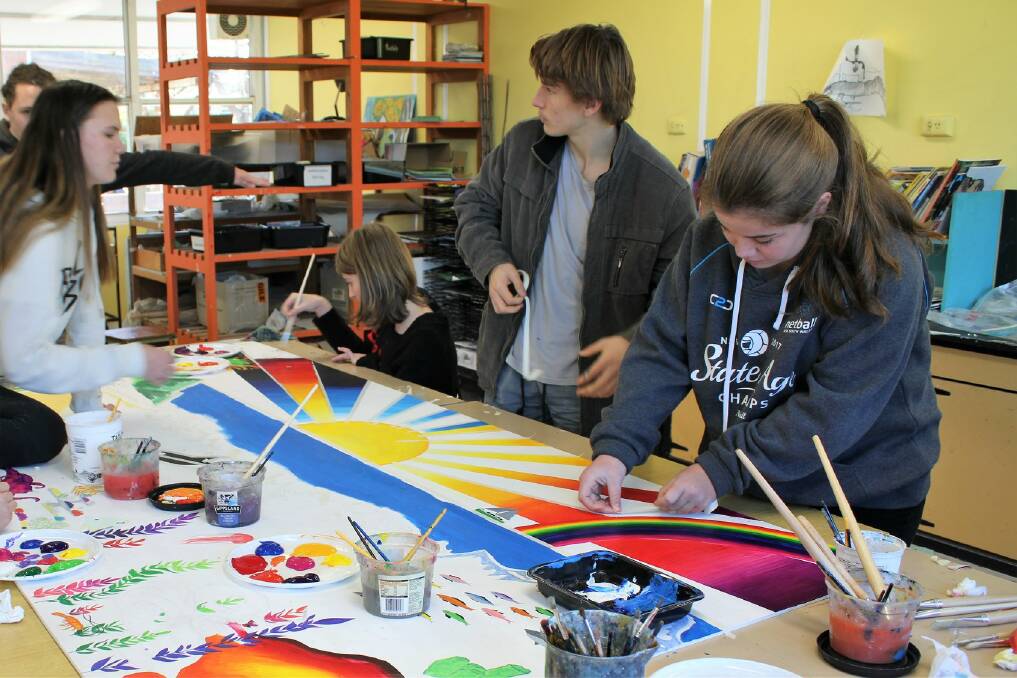 Eden Marine High School Year 10 students take part in an Ocean Week mural workshop with local artist Annie Reid.