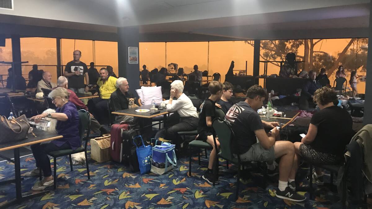Evacuated residents shelter at Tura Beach Country Club.