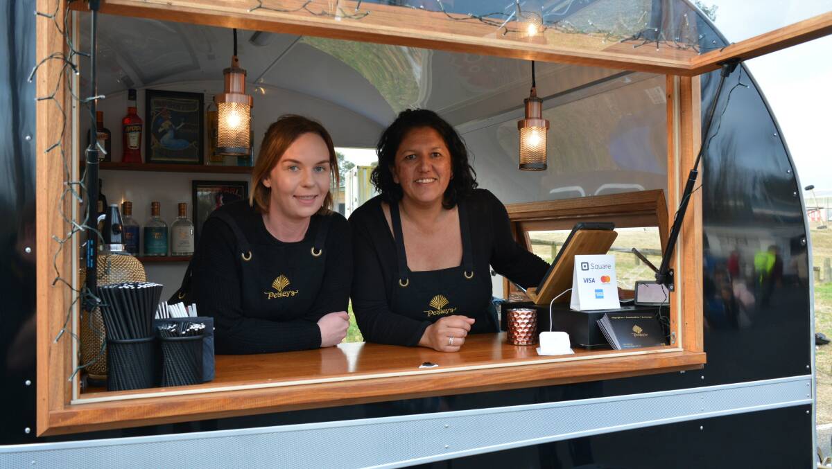 FEAST FOR THE SENSES: Rhiannon Duke and Clair Mudaliar of Peisley's take part in Food Truck Friday on the last night of winter in Bega. Photo: Ben Smyth