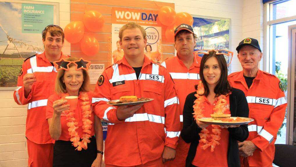 Eden SES volunteers pictured at a 2017 Wear Orange Wednesday celebration include James Knox, Bradley Chalker, Mark Lawrence and Nev Cowgill with NRMA Merimbula staff Clare Miller and Maddi Richardson.