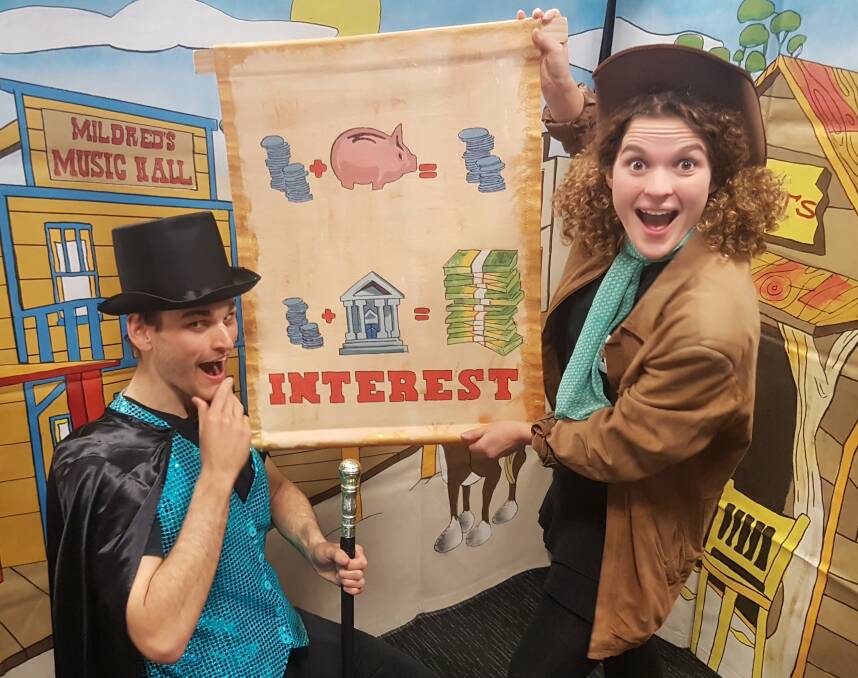 National Theatre for Children actors Nick James and Katherine Pearson teach pupils about financial literacy through their touring show with Horizon Credit Union.
