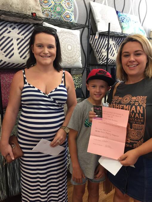 Laura Campbell and Zoe Heffernan won the Our Eden and Roses Property Management shopping vouchers. (Pictured with Rylan)