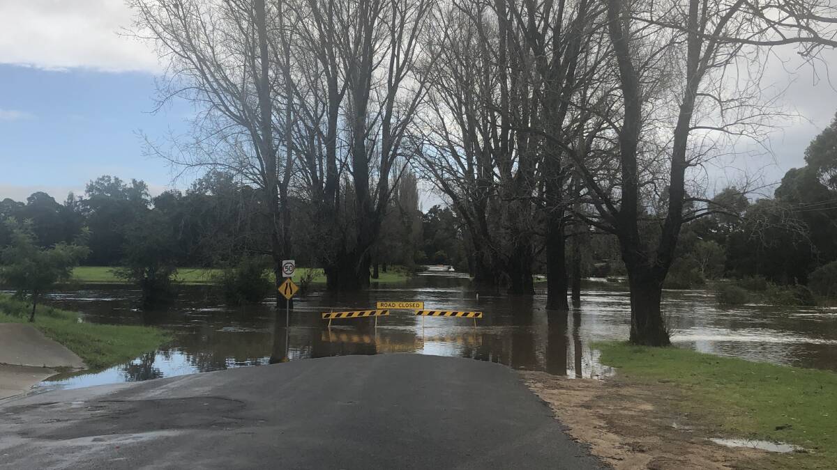 East St in Bega is often among the first to go under when rain causes the river to rise, thereby cutting off access to the Old Bega Racecourse COVID-19 testing clinic.