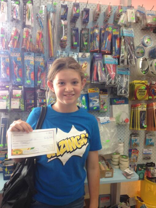 SHOP LOCAL: Kaitlyn Schofield spends a Roses Property Management voucher as part of the recent Eden Cash Mob.