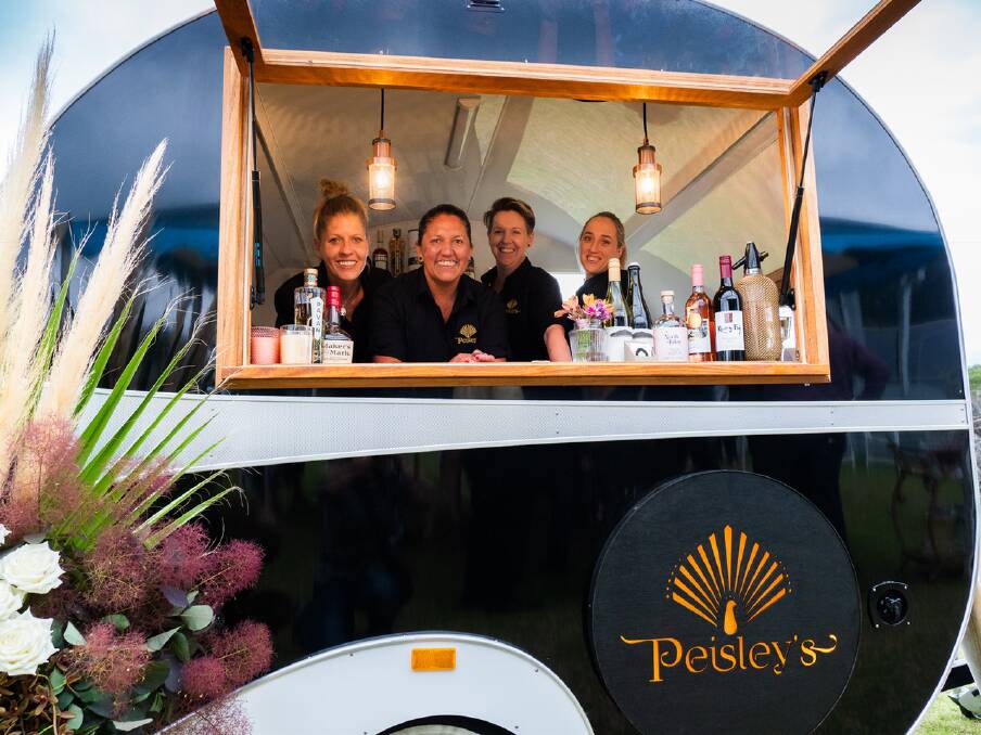 WORKING TOGETHER: Clair Mudaliar and the crew of Peisley's mobile bar were one of four local businesses serving up local produce at New Shoots recently.