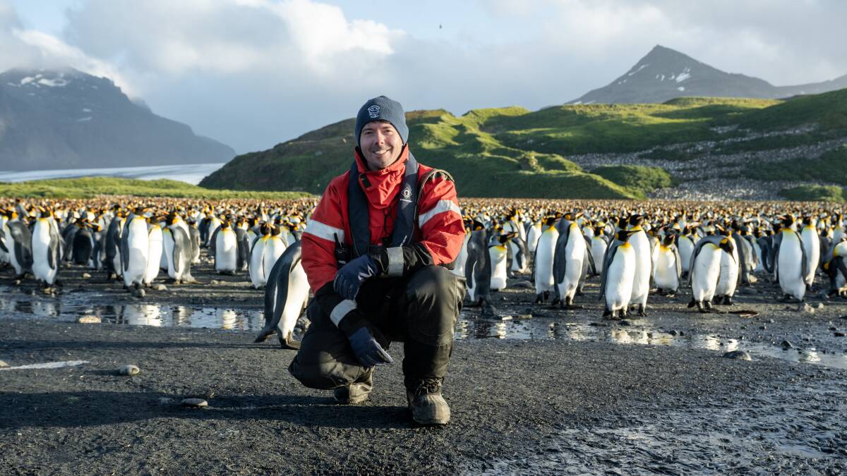 Allankay captain Peter Hammarstedt poses with emperor penguins on South Georgia Island. Picture supplied