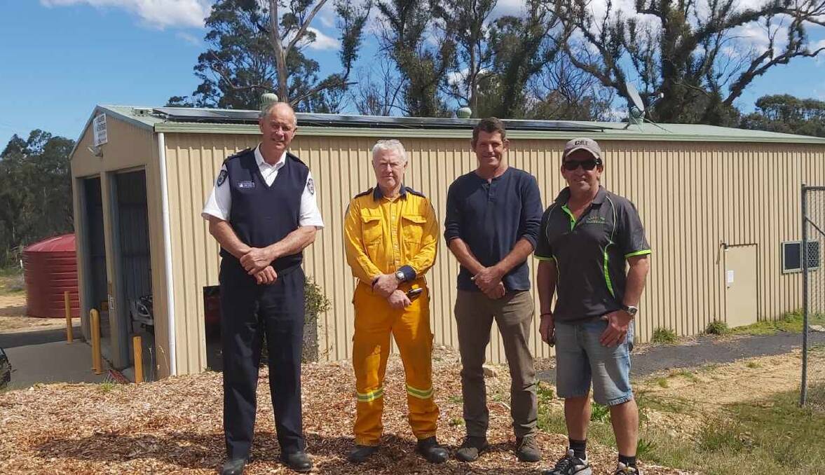 WELCOME DONATION: Celebrating the installation of solar panels on Kiah's fire shed are RFS Superintendent John Cullen, the fire brigade's Jeff Browning, CEFE's Derek Povel and Lakeside Electrical's Paul Palacios. Picture: Supplied 