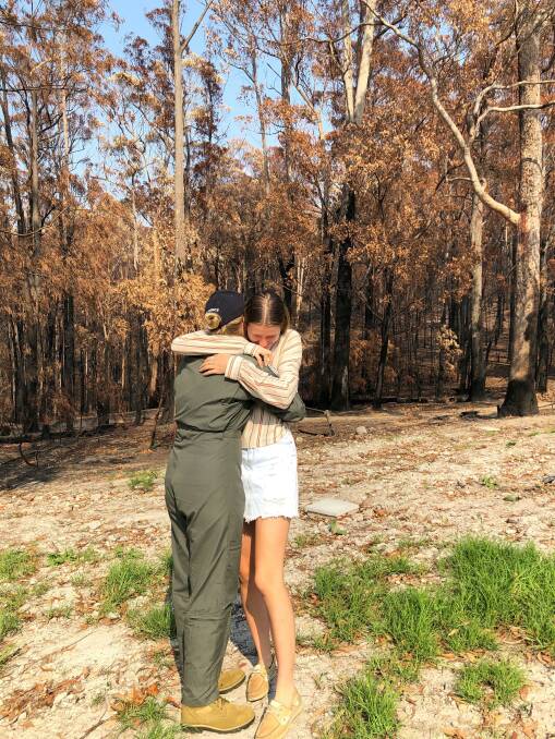 Pilot Officer Isabella Filmer reunites with family during a trip home to Mallacoota.
