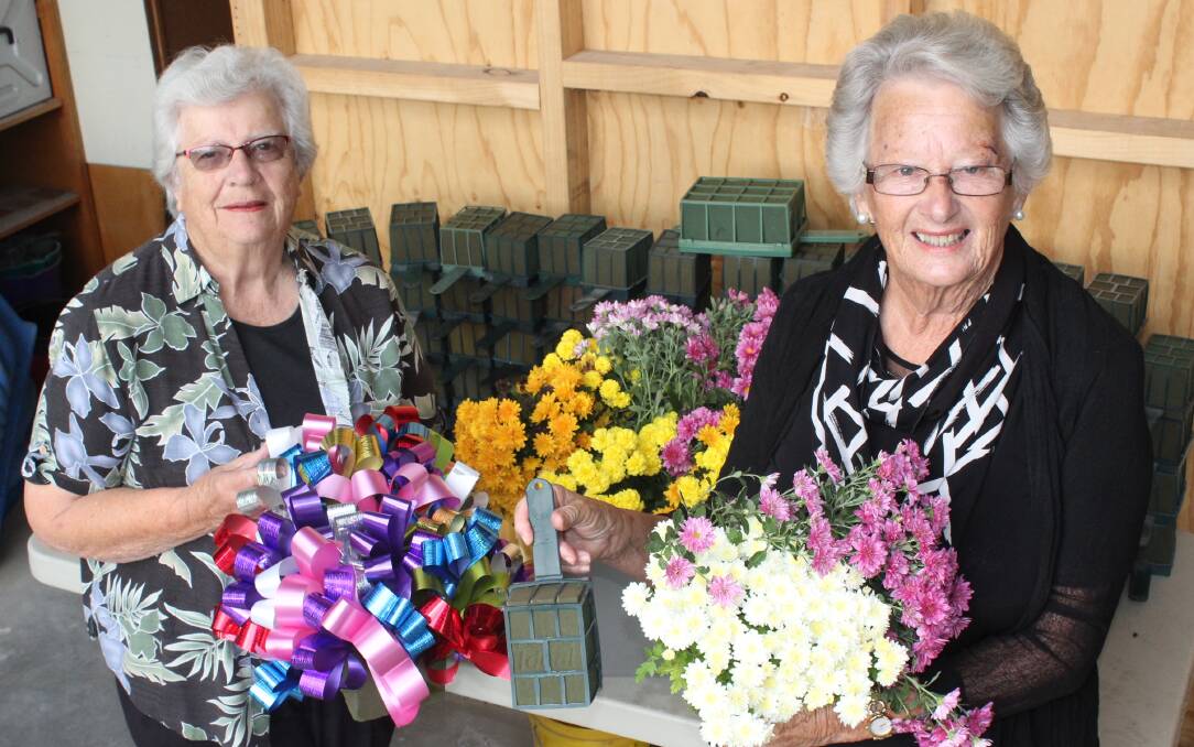 Edna Duncanson and Helen Slater help create Anzac Day wreaths for services across the shire, and they need your help.