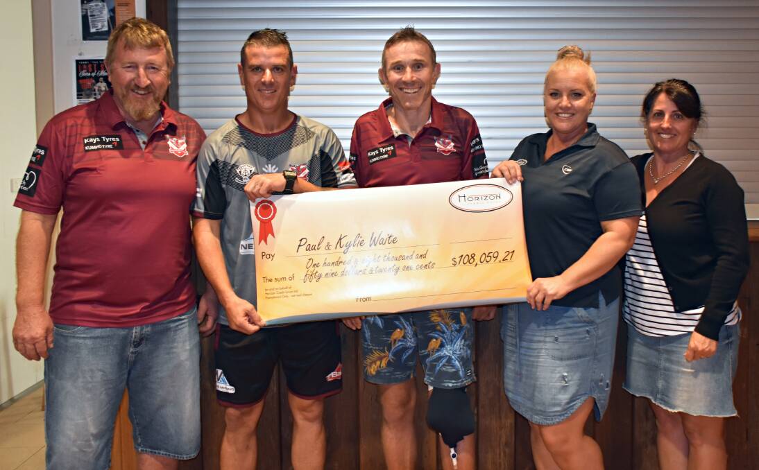 Ralph Clarke, Gary Breakspear, Paul Waite, Michelle Jones and Kylie Waite with a cheque of the funds raised for Paul's recovery. Photo: COURTNEY WARD