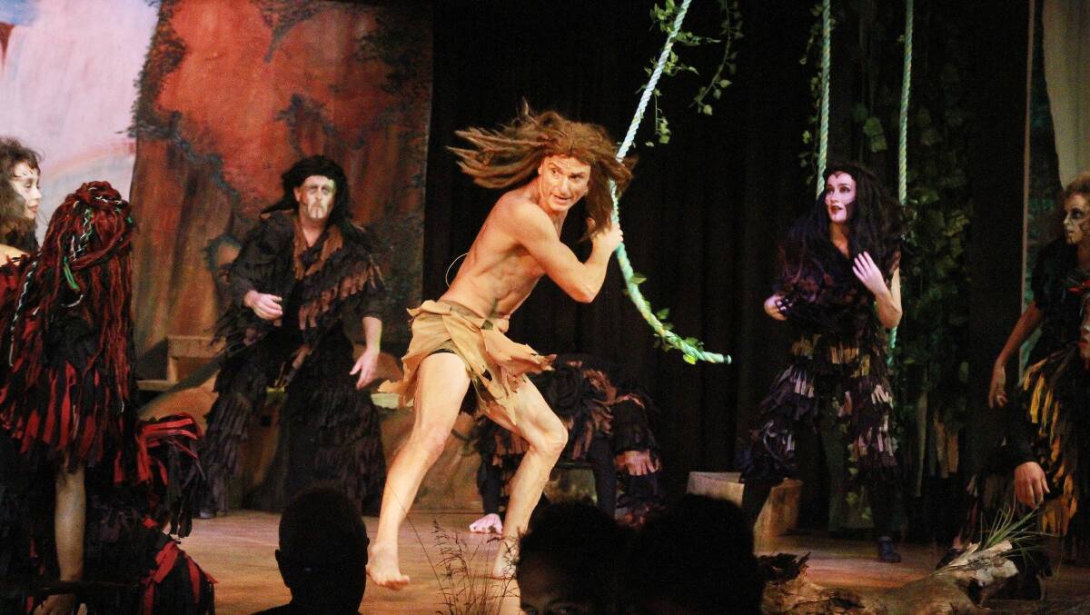 An action shot as Tarzan swings in during the Dreamcoat Theatre Productions show at Twyford Hall. Photo: Angi High