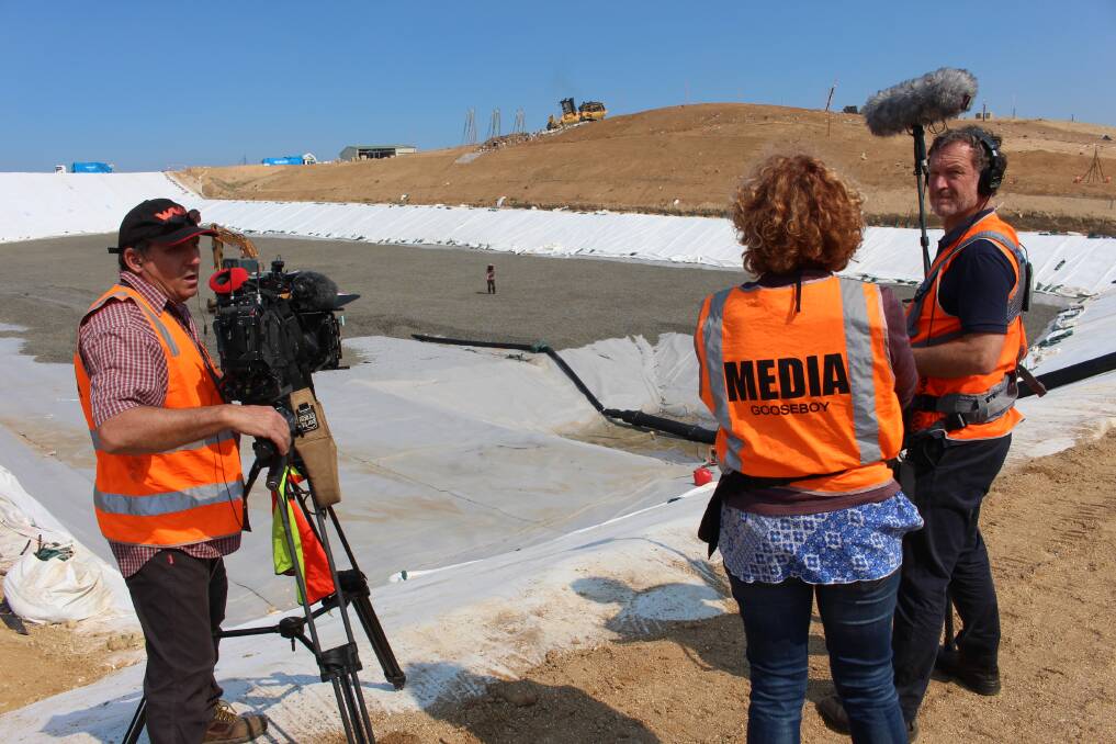 Local media productions company, Gooseboy productions film Mr Georgiadis standing in the centre of the landfill cell.