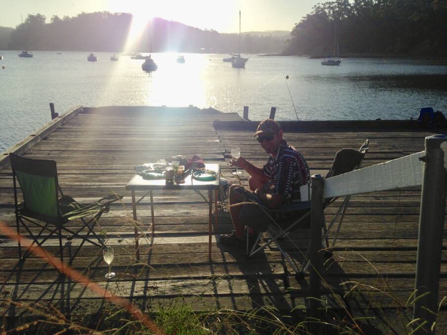 Cute date: Locheil residents enjoying some fish and chips for dinner by a jetty in Eden.