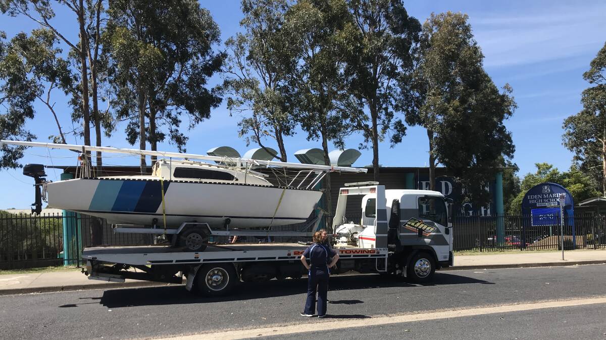 The trailer sailer arrives at Eden Marine High School on the back of King Smash Repairs' truck. 