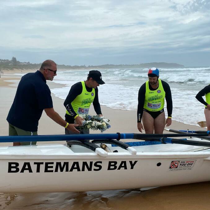 The Batemans Bay crew have a close connection with Austinmer surf club and initiated in a special tribute to sweep Denis Patison. Image: Ocean Thunder Facebook.