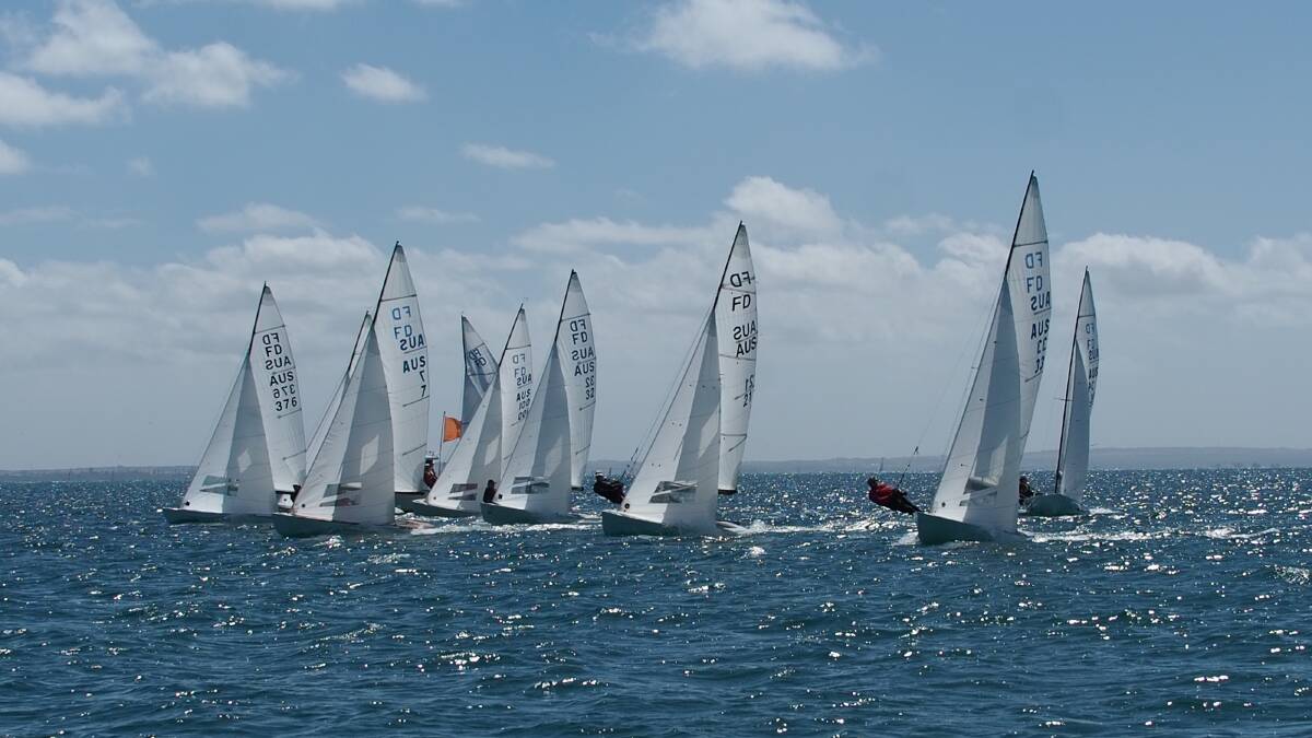 The Flying Dutchman fleet lines up for the start of heat three of the 2017 Australian Championships at Sorento on Port Phillip Bay. You can see the 2018 series on Twofold Bay this weekend as part of the Eden regatta.