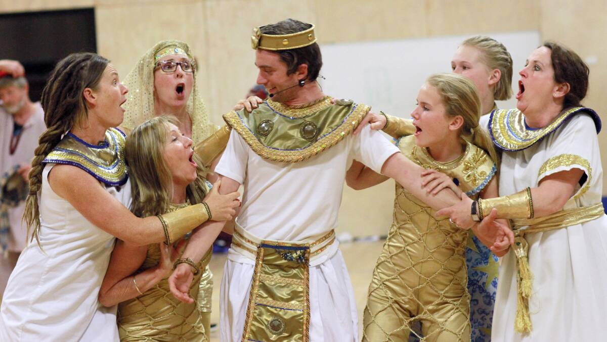 ‘Joseph’, played by Jesse Zammit, being swarmed by a group of Egyptian maidens during a scene from Joseph and the Amazing Technicolour Dreamcoat in 2016. 