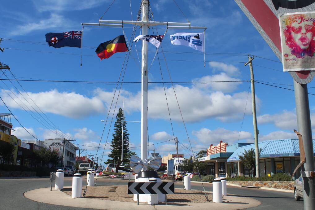 LIFE'S A BREEZE: The Eden flag mast celebrates its 25th birthday this week, resplendent in big silver bow.